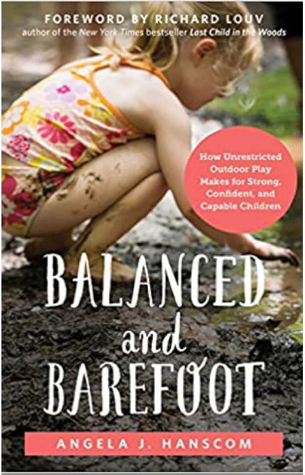 Child balanced on one foot outdoors showing coordination skills developed through active play